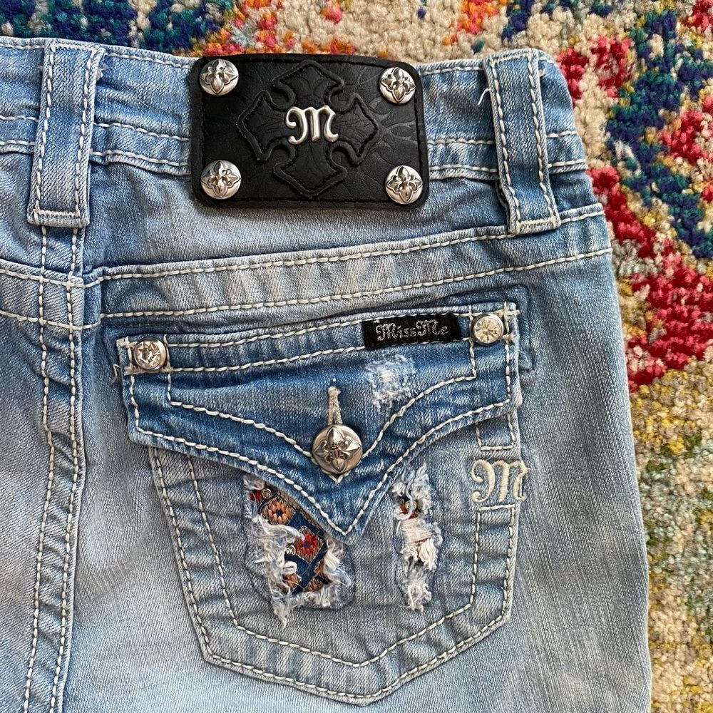 Miss Me Signature Rhinestone Embroidered Blow Out Flap Pocket Skinny Jeans